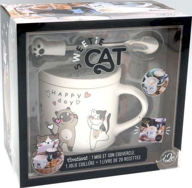 Coffret Sweetie cat. Contient : 1 mug et son couvercle, 1 jolie cuillère et 1 livre e 20 recettes