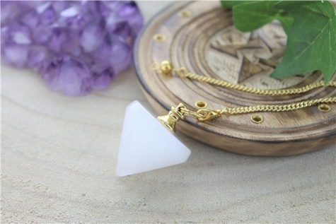 PENDULE TOUPIE EN CRISTAL DE ROCHE