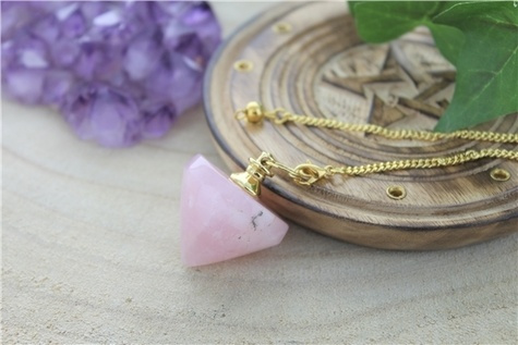 PENDULE TOUPIE EN QUARTZ ROSE