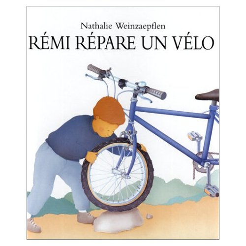Rémi répare un vélo