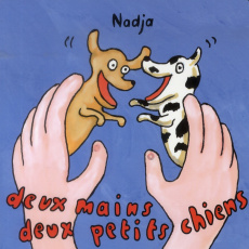 Deux mains deux petits chiens - NADJA