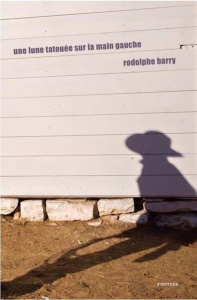 Une lune tatouée sur la main gauche - Barry Rodolphe