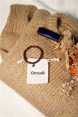 Emprunter Bracelet Oeil de Taureau Perles rondes 6 mm livre