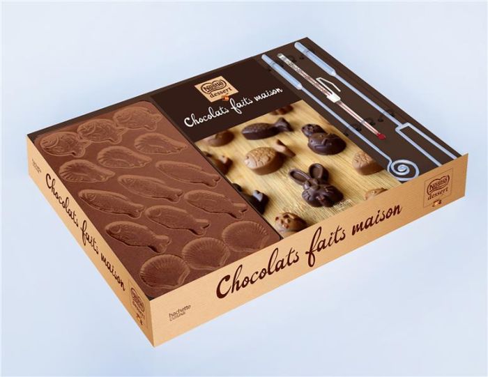 Emprunter Coffret Nestlé dessert® Chocolats faits maison. Avec 1 livret de recettes, 2 plaques de moules, 2 pi livre