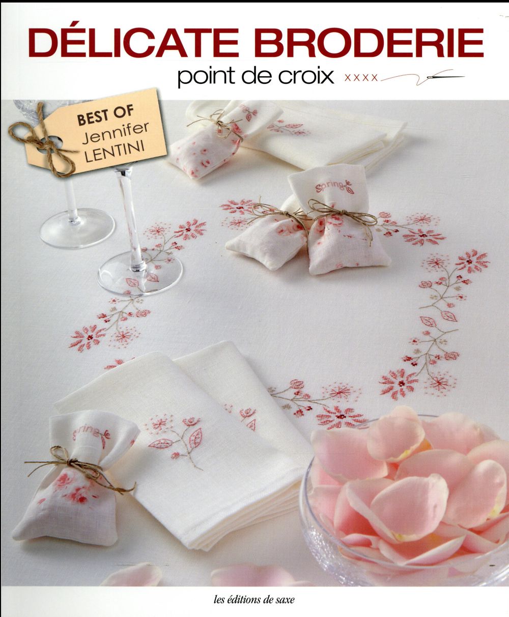 Délicate broderie. Point de croix